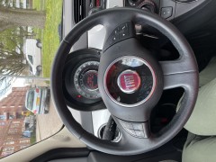 Fiat 500 1 2 uit 2010 met panoramadak en zomer winterbanden