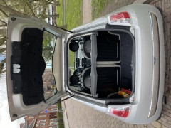 Fiat 500 1 2 uit 2010 met panoramadak en zomer winterbanden