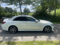 Mercedes C-klasse 200 Amg line parelmoer wit luchtgeveerd