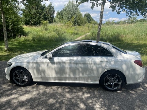 Mercedes C-klasse 200 Amg line parelmoer wit luchtgeveerd