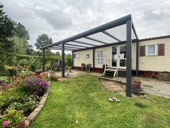 Tuinkamers overkapping carport glazen schuifenwanden zonwering schuifp