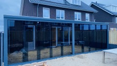 Tuinkamers overkapping carport glazen schuifenwanden zonwering schuifp