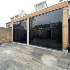 Tuinkamers overkapping carport glazen schuifenwanden zonwering schuifp