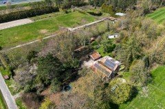 Woning met 1 8 ha eigen grond