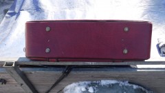 Rode lederen reiskoffer